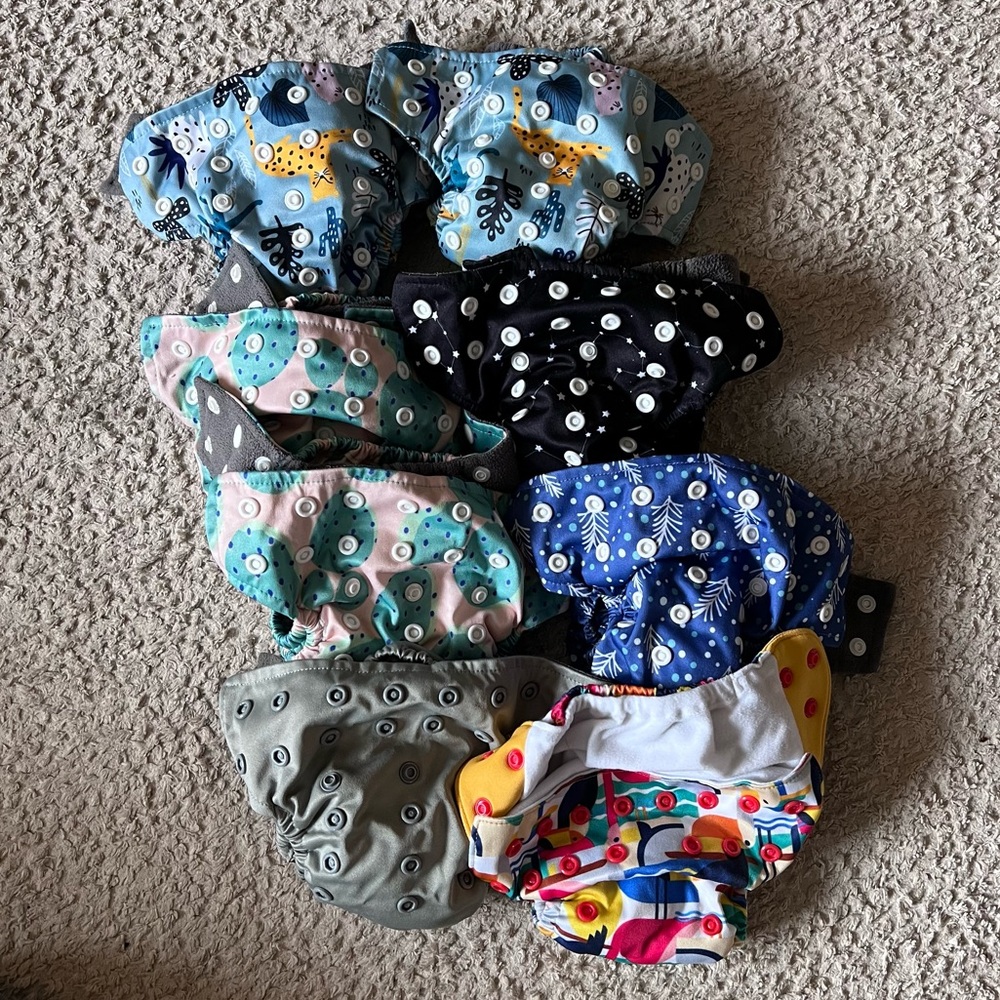 Lot of 8 newborn all-in-one cloth diapers